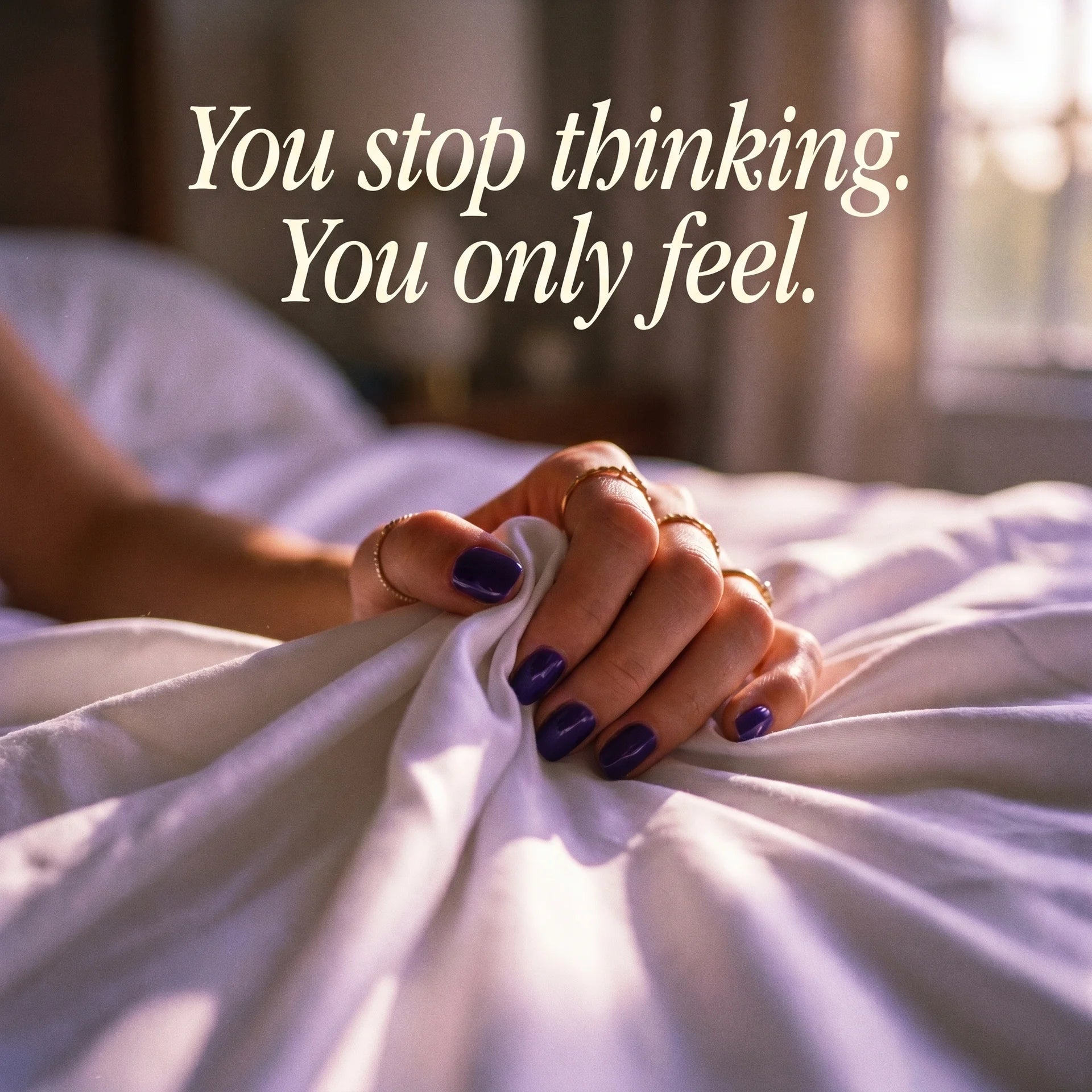 Person holding white sheets with a quote about thinking and feeling, in a softly lit bedroom.